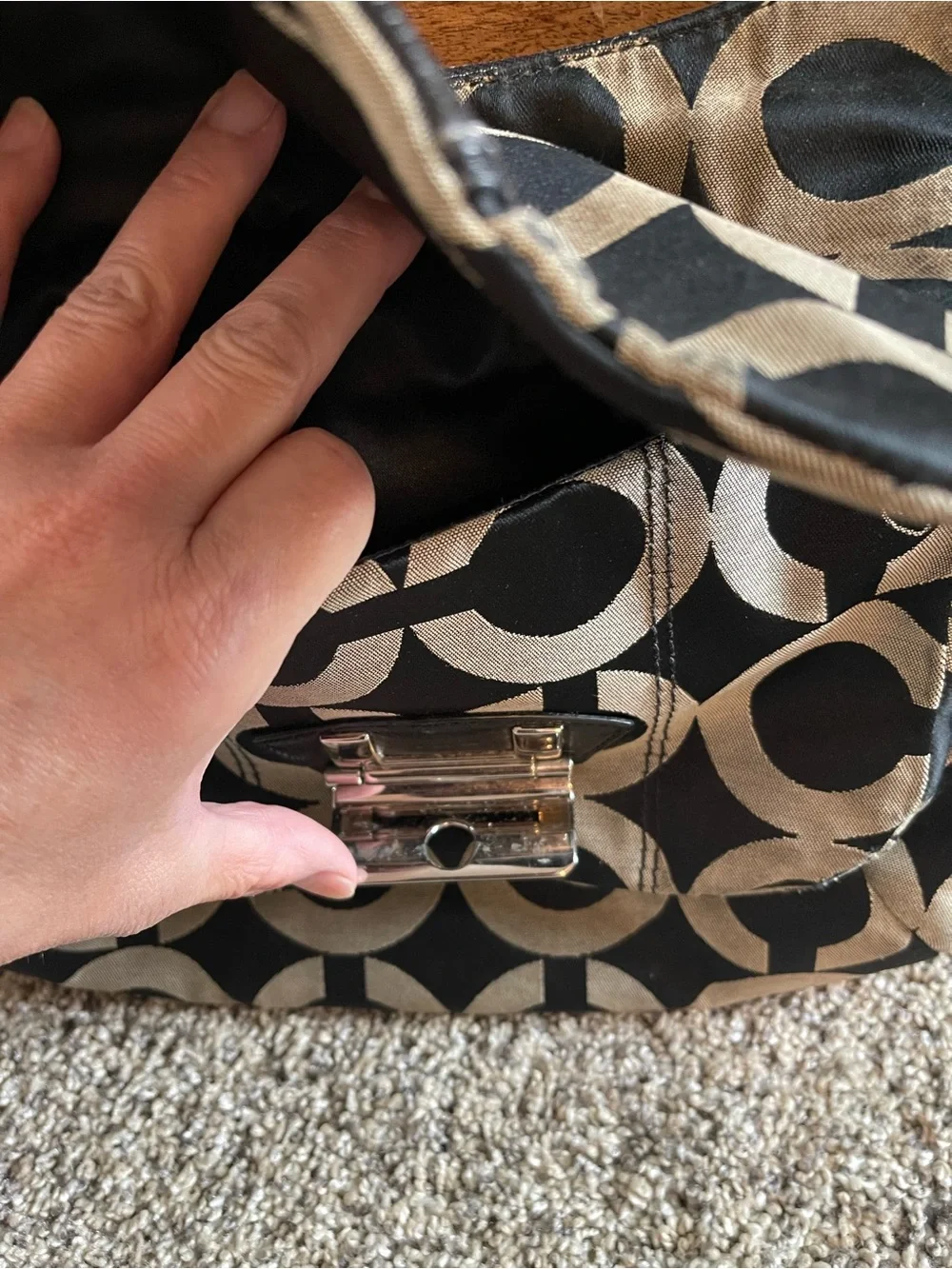 Vintage Coach Black and Tan Signature Circle-Print Hobo with silver lock clasp